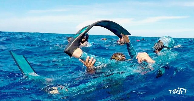 two divers under water