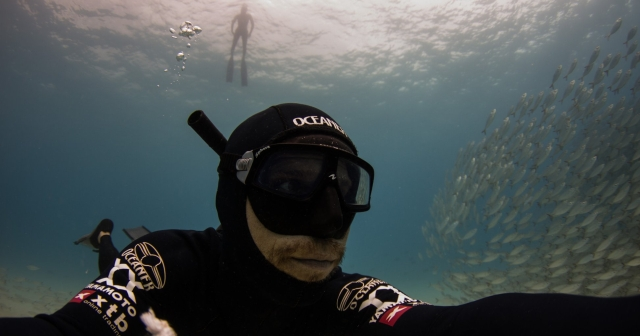 two divers under water